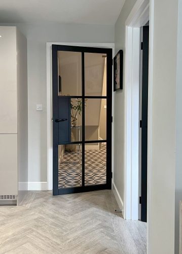 Puerta abatible hierro y cristal